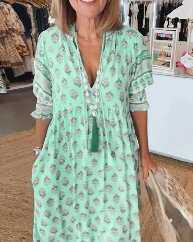 V-Neck Half-Sleeve Dress for Women – Bold Print & Effortless Comfort 6